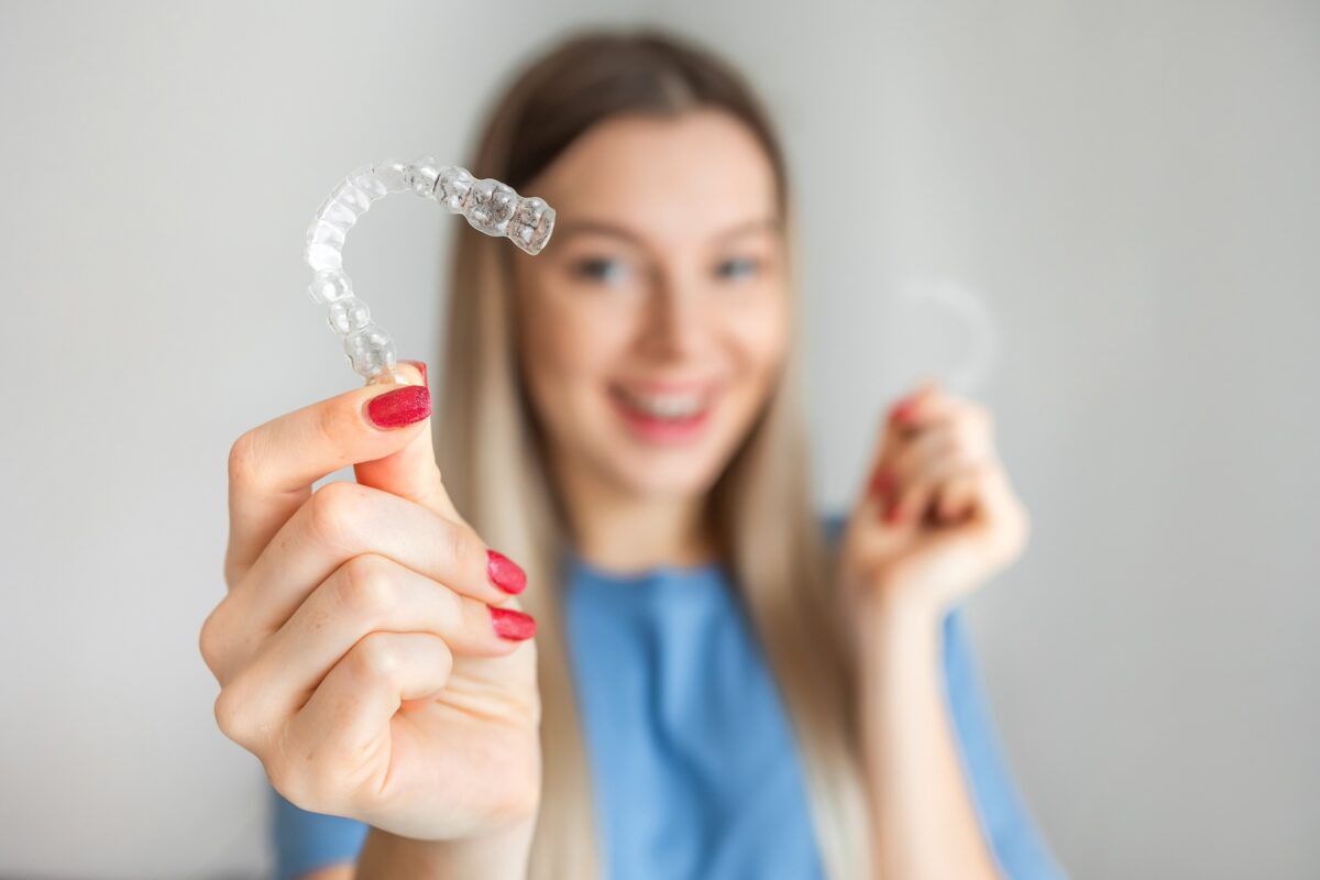 How Does Invisalign Work to Move Teeth